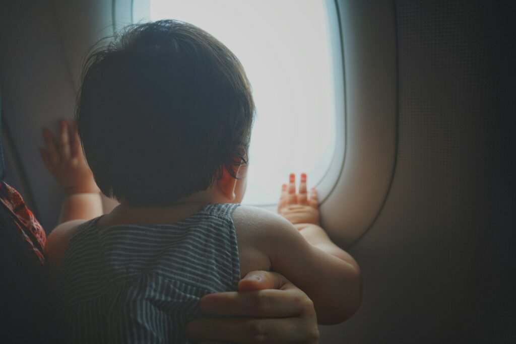 boy facing window
